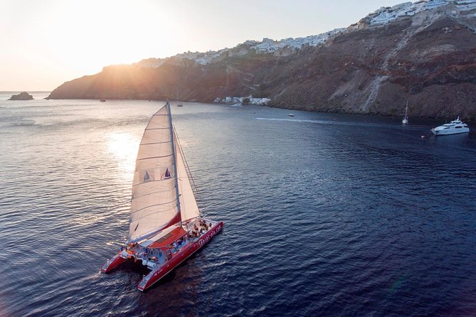 Sailing Catamaran Cruise in Santorini with BBQ, Drinks and Transfer - Sea conditions: how to plan for wind, chop, and a long boat day
