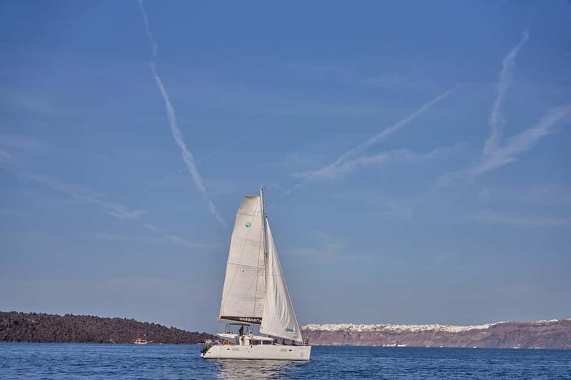 Santorini: Caldera Classic Catamaran Cruise w/ Meal & Drinks - Pickup, minibus transfer, and arriving at Vlichada Marina