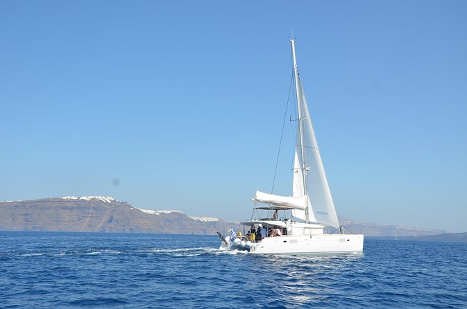 Santorini Caldera Gold Day Cruise with BBQ on board and Open Bar - The Real Water Highlight: Nea Kameni Hot Springs and Snorkel Time