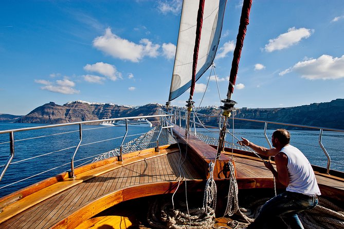 Santorini Caldera Sunset Sailing Cruise with Dinner and Wine - What you should bring, and what you should not assume is provided