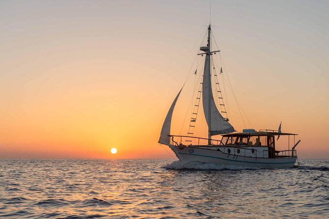 Santorini Caldera Sunset Traditional Cruise with Meal and Drinks - From Ammoudi Bay to sunset: what makes this cruise work