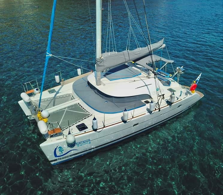 Santorini: Catamaran Cruise with Food and Drinks - White Beach and the Photo Stop That Keeps Things Moving