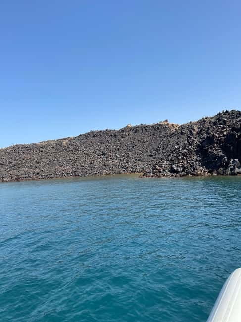 Santorini: Catamaran Cruise with Food and Drinks - Music, Crew Energy, and the Names You Might Hear