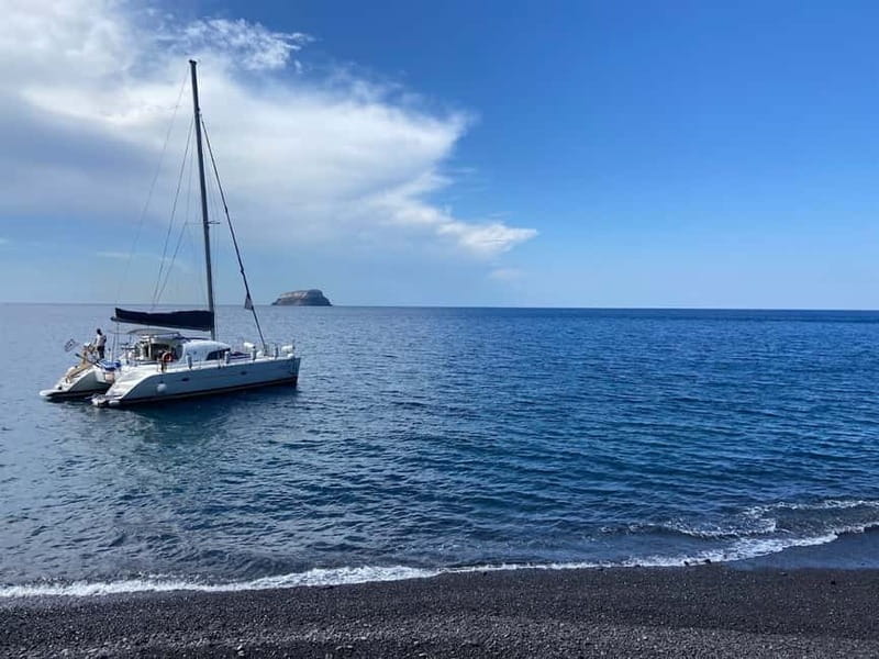 Santorini: Catamaran Cruise with Food and Drinks - Red Beach Swim Stop, Volcanic Color Up Close