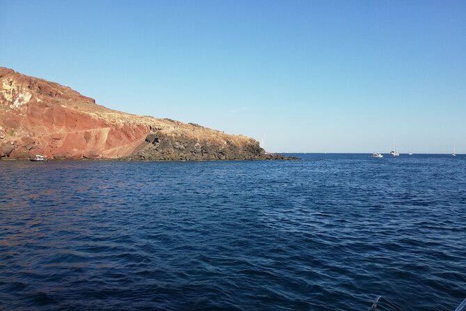 Santorini Catamaran Cruise with Fresh Meal and Open Bar - First Step: Smooth Hotel Pickup, Then Vlychada Port