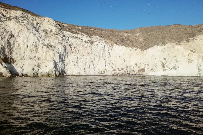 Santorini Catamaran Cruise with Fresh Meal and Open Bar - Red Beach Stop: Rust-Colored Rocks and a Quick Swim