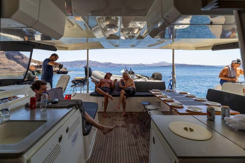 Santorini: Catamaran Cruise with Fresh Meal & Open Bar - Lunch or dinner on board with Greek food and an open bar