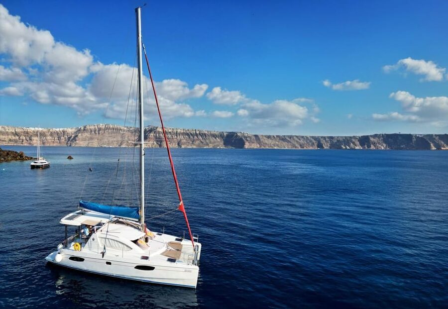 Santorini: Catamaran Cruise with Greek BBQ and Drinks - Why this Santorini catamaran route feels different than a bus tour