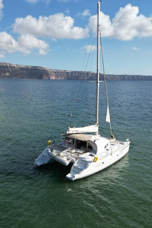 Santorini: Catamaran Cruise with Greek BBQ and Drinks - Nea Kameni hot springs: the sulphur soak people remember