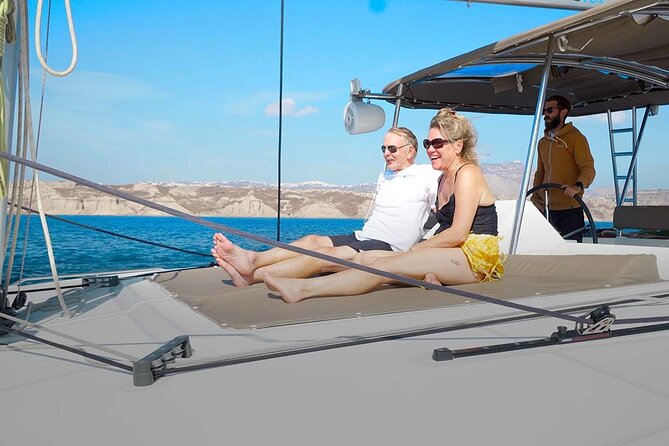 Santorini Catamaran Cruise with Greek Meal, Open-Bar and Sunset - Red Beach Swim Time: Where the Color Comes From