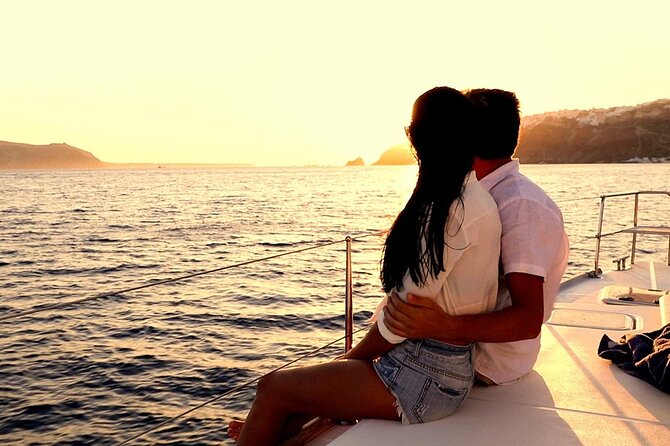 Santorini Catamaran Cruise with Greek Meal, Open-Bar and Sunset - Nea Kameni Hot Springs: The Warm Sulfur Water Stop