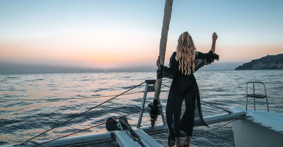 Santorini Catamaran Cruise with Swimming, Meal and Open Bar - The Caldera Views and the Akrotiri Lighthouse Pass-By