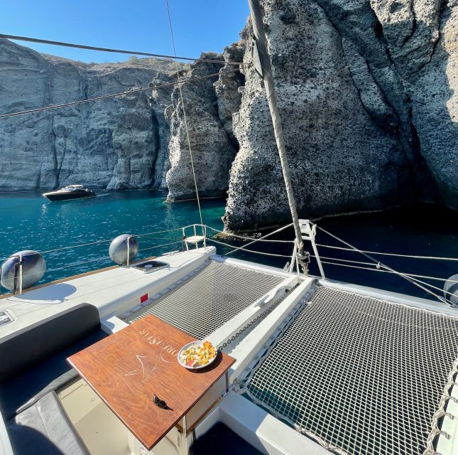 Santorini Catamaran Cruise with Swimming, Meal and Open Bar - Thirassia Island: Lunch, BBQ, Swimming, and Snorkeling Time