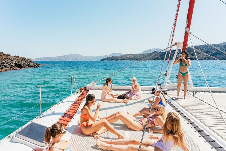 Santorini: Catamaran Tour with BBQ Dinner, Drinks, and Music - What to bring so you’re comfortable the whole 5 hours