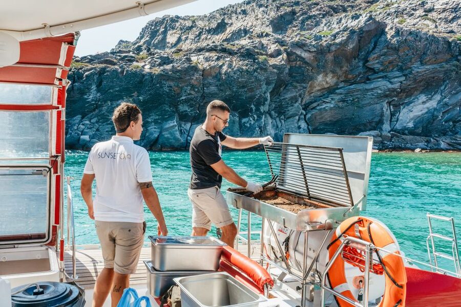 Santorini: Catamaran Tour with BBQ Dinner, Drinks, and Music - BBQ dinner onboard: why the food timing matters