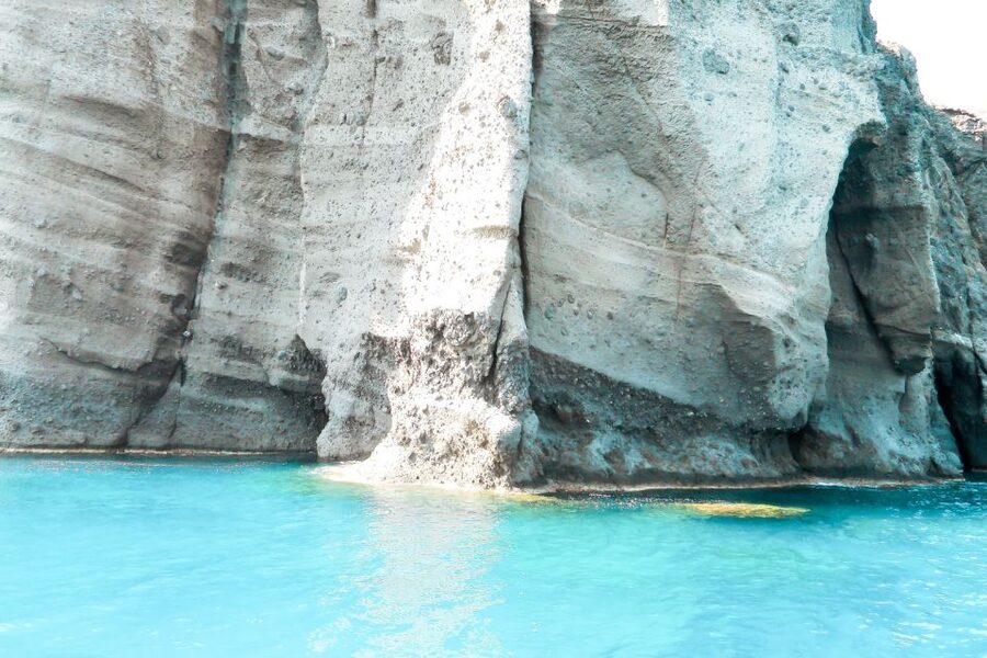 Santorini: Catamaran Tour with BBQ Meal and Unlimited Drinks - Hot springs near Nea Kameni, plus caldera scenery that looks different from the water