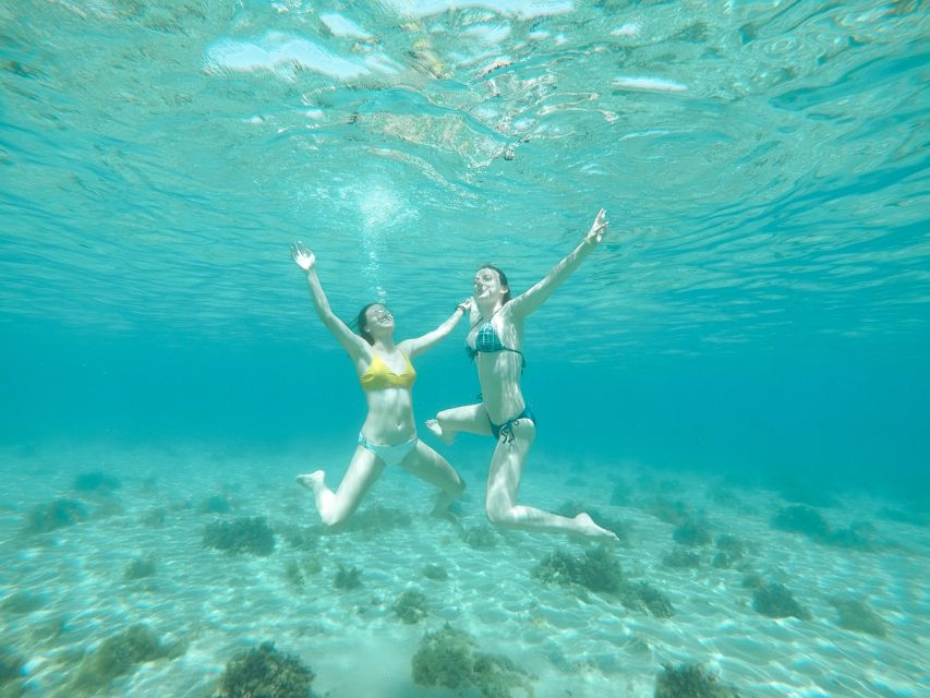 Santorini: Day Cruise with Meal & Open Bar - Hot springs on the volcanic islands: what you should expect