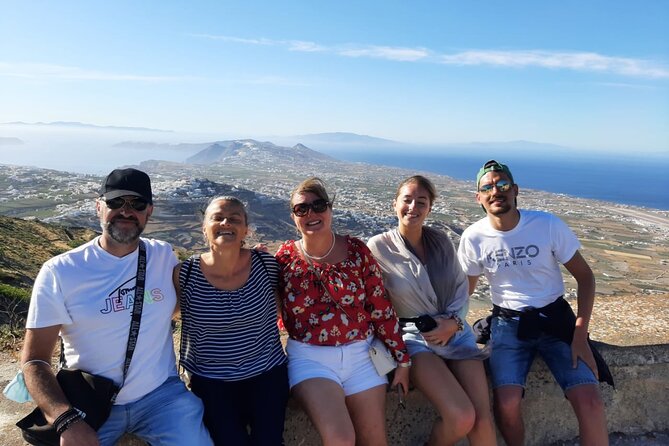Santorini First-time Visitors Private Tour with Wine Tasting - Oia main street: churches, museums, and smart timing for sunset