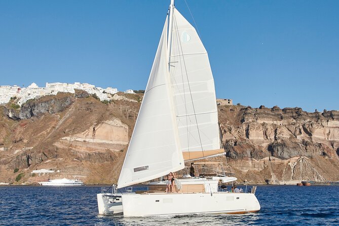Santorini Gold Catamaran Cruise with BBQ, Drinks and Hotel Pickup - Santorini Volcano and Hot Springs: Healing Waters and Real Expectations