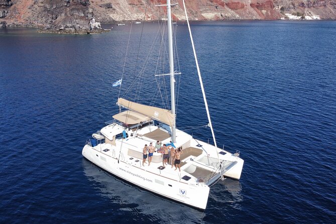 Santorini Gold Catamaran Cruise with BBQ, Drinks and Hotel Pickup - Red Beach and White Beach: The Color Story, Plus Time in the Water