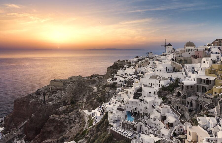 Santorini: Island Highlights Guided Day Trip with Oia Sunset - Fira Town: shopping, snacks, and caldera photos