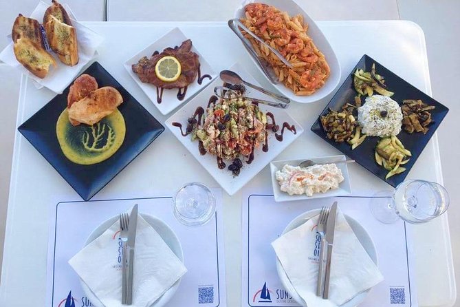 Santorini Luxury Catamaran Day Cruise with BBQ,drinks,transfer - Luxury Catamaran Comfort: Restroom, Towels, Blankets, and Safety Notes