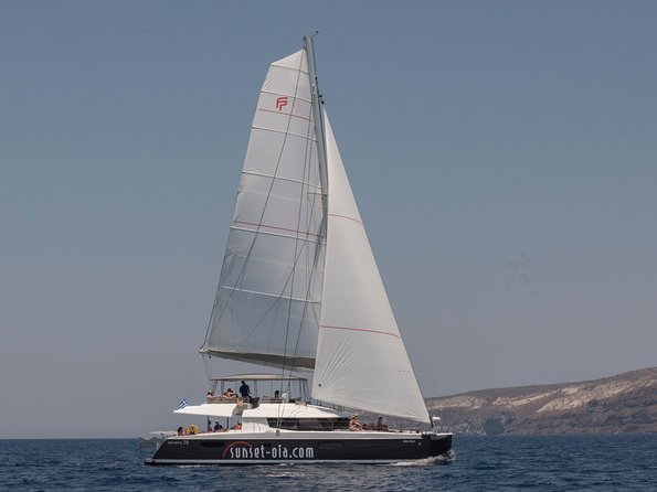 Santorini Luxury Catamaran Day Cruise with BBQ,drinks,transfer - White Beach Snorkeling and BBQ: The Stop That Feels Like the Main Event