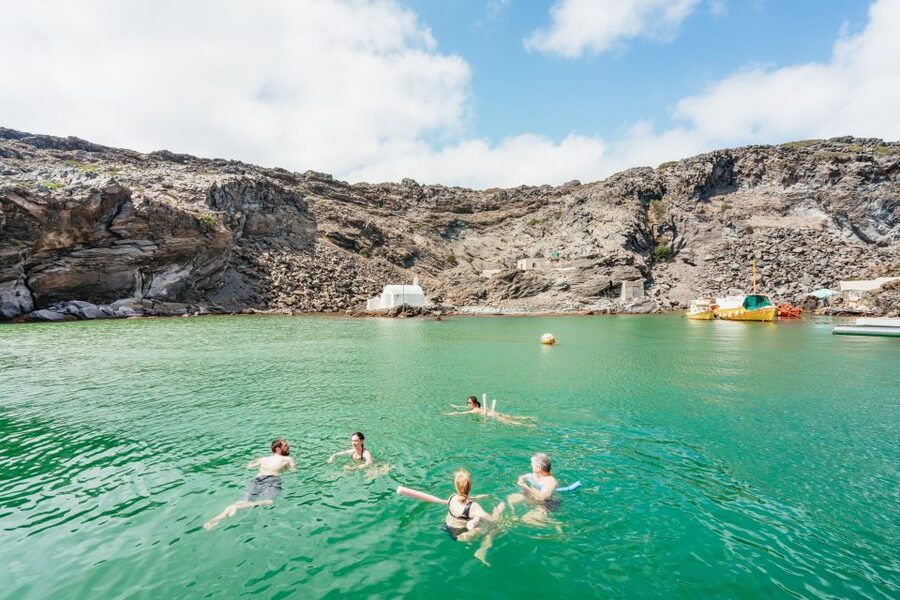 Santorini: Luxury Catamaran Day Trip with Meal and Open Bar - Open Bar Rituals and the Sunset Oia Experience