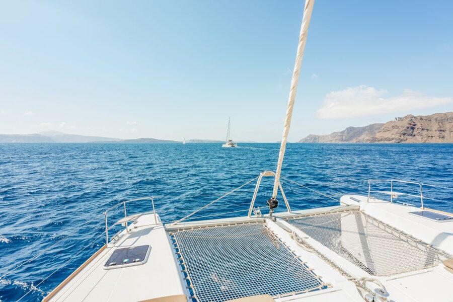 Santorini: Luxury Catamaran Day Trip with Meal and Open Bar - The Red and White Beach Stops: What You Actually Do in the Water