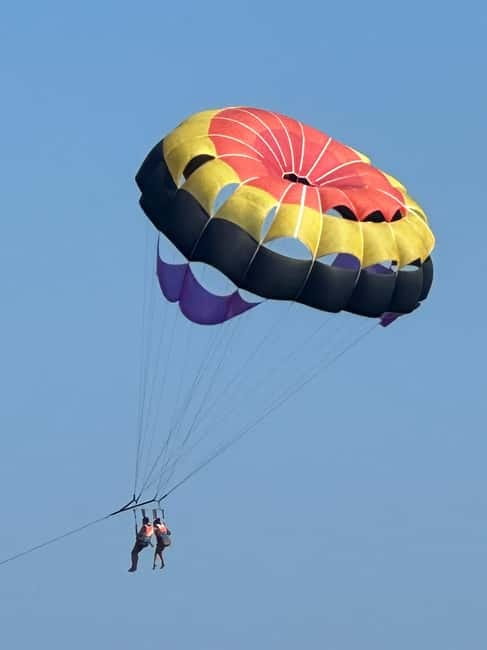 Santorini: Parasailing ExperiencePerissa,Perivolos,St.George - Why Parasailing Over Santorini’s Black Beach Feels Different