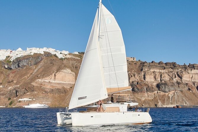 Santorini Platinum Catamaran Cruise with Meal, BBQ and Open Bar - From Vlichada to the catamaran: how the day starts and why timing matters