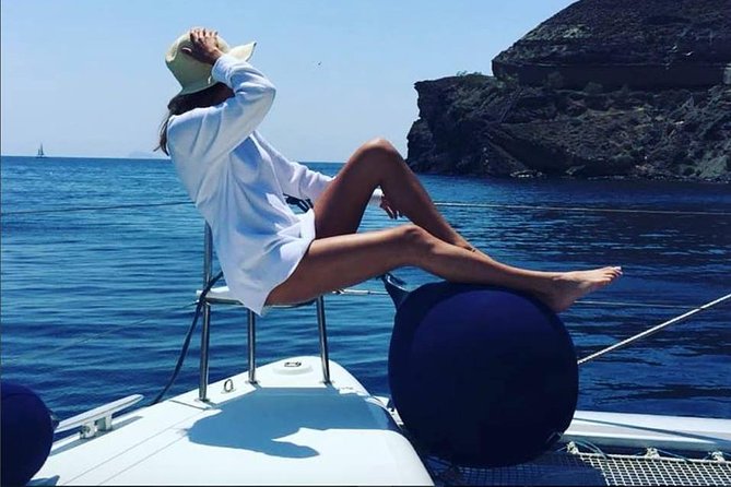 Santorini Platinum Catamaran Cruise with Meal, BBQ and Open Bar - Volcano hot springs: caves, volcanic sand, and a short soak without the hike
