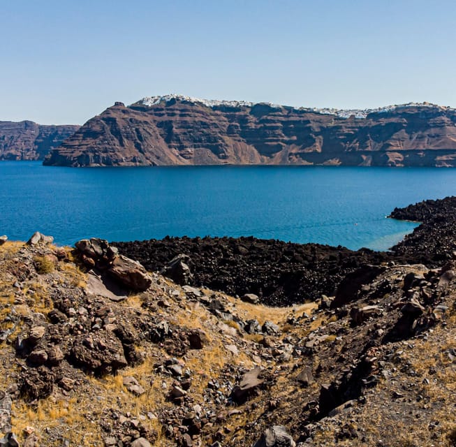 Santorini Port: 3 Hour Cruise to Volcano and Hot Springs - Meeting at Fira Old Port and sliding into the caldera views