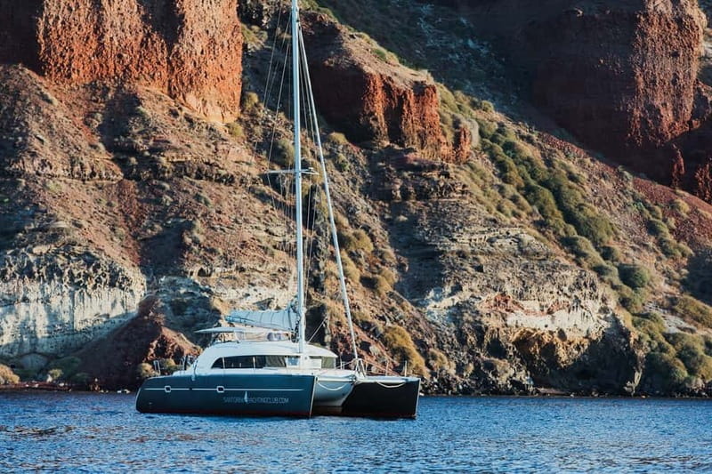Santorini: Private Catamaran Cruise with BBQ Meal and Drinks - Key highlights at a glance