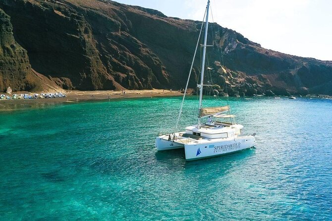 Santorini Private Catamaran Cruise with BBQ, Open Bar & Transfers - White Beach by boat: where the snorkeling is the point