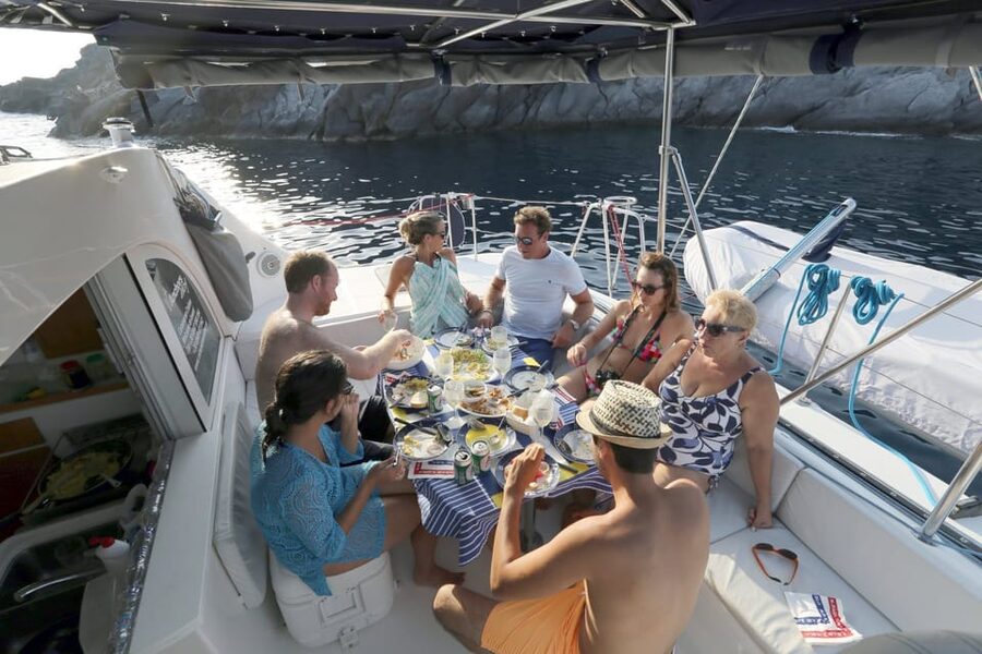 Santorini: Private Catamaran Cruise with Food & Drinks - The Lighthouse, Aspronisi, and Volcanic Islands: The Views Between Swims