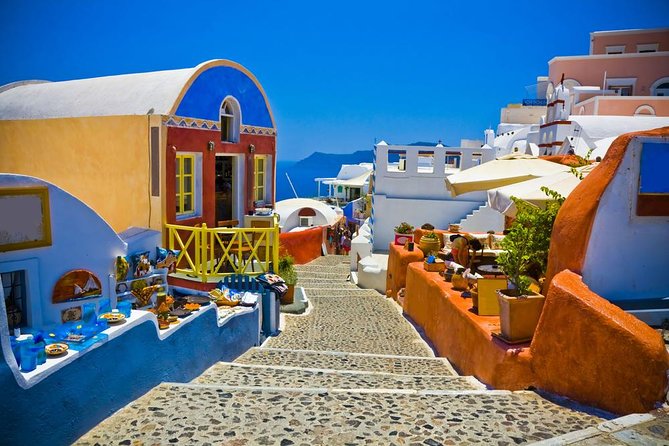 Santorini: Private Sightseeing Tour - Firostefani blue domes in a quick photo window