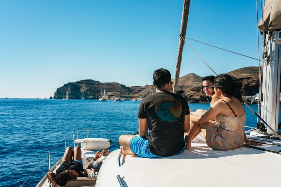 Santorini: Sailing Catamaran Cruise with BBQ and Drinks - Palea Kameni hot springs: soaking the sulfur, then moving on