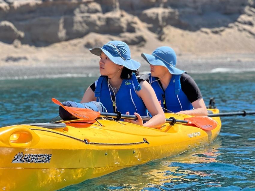 Santorini: Sea Caves Kayak Trip with Snorkeling and Picnic - White Beach cliff jumping: adrenaline without chaos