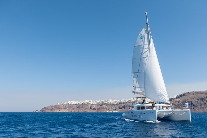 Santorini Small-Group Catamaran Sailing Trip(BBQ,drinks, transfer) - Hot Springs Swim: The 50-Meter Reality and the Payoff