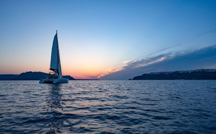 Santorini: Sunset Cruise with Swim Stops, Dinner, and Drinks - The Sunset from the Water, and How to Enjoy It Without Stress