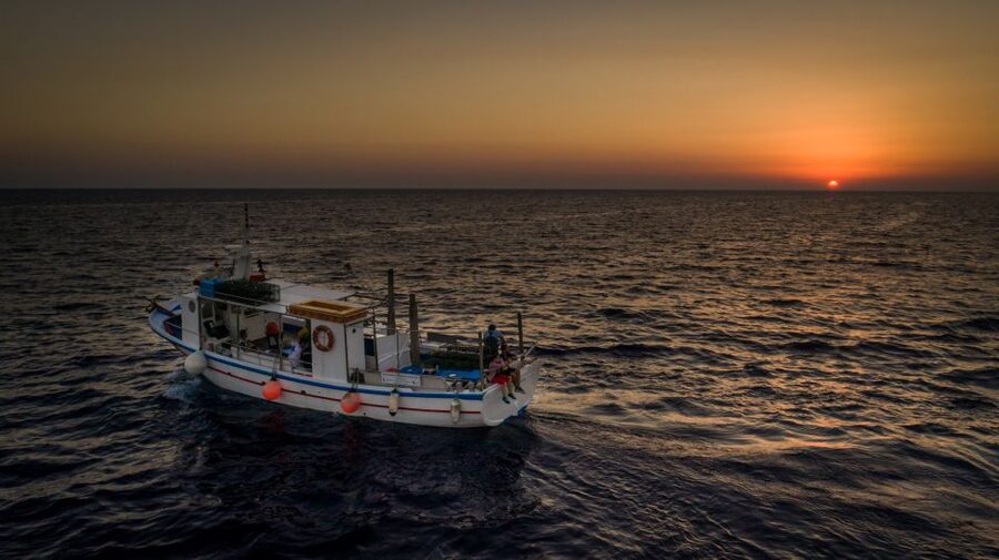 Santorini Sunset Fishing Trip with Dinner and Drinks - A Working Fishing Boat for Your Santorini Sunset