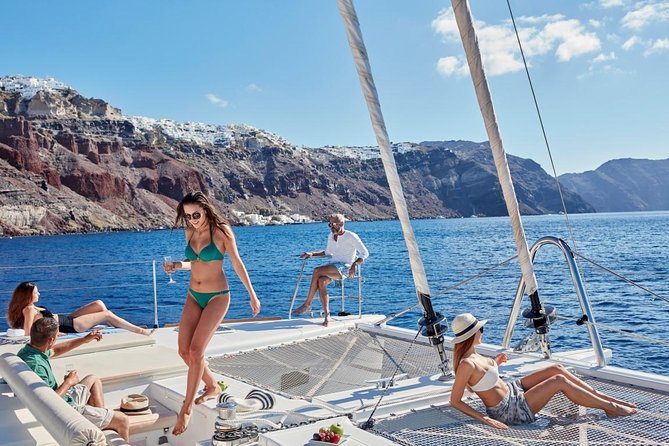 Santorini Sunset Luxury Sailing Catamaran Cruise with BBQ, drinks, transfer - From your hotel to the catamaran: the transfer that saves your day
