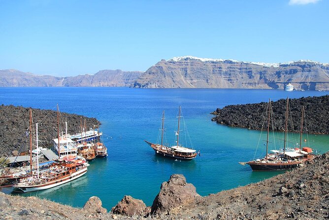 Santorini Sunset Sailing Cruise: Dinner, BBQ, Open Bar, Transfers - Sailing Highlights: White Beach, Indian Rocks, and the Venetian Lighthouse