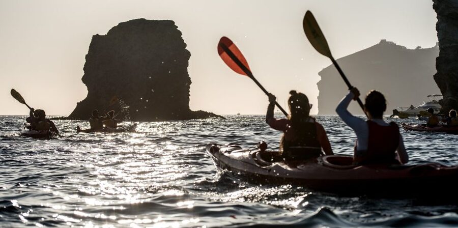 Santorini: Sunset Sea Kayak with Light Dinner - Swim time and sea cave moments up close