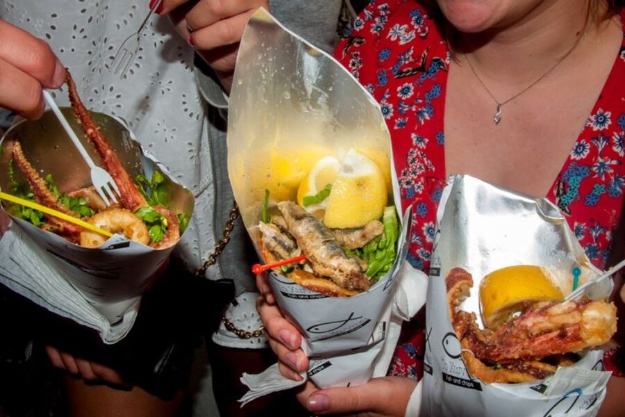 Santorini: Sunset Walking Tour with Local Food and Drinks - A food-first way to experience Santorini’s sunset route