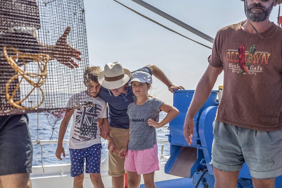 Santorini: Traditional Fishing Trip and Fresh Fish Lunch - Snorkeling and swim time when the sea allows