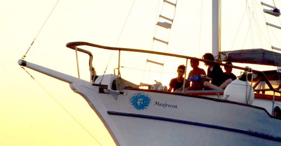 Santorini: Traditional Wooden Boat Tour with Meal and Wine - Sunset option in reverse, and where the atmosphere changes