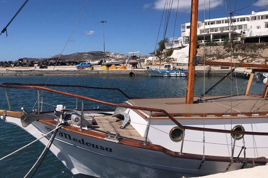 Santorini: Traditional Wooden Boat Tour with Meal and Wine - Weather, rough seas, and what to pack so the trip stays fun