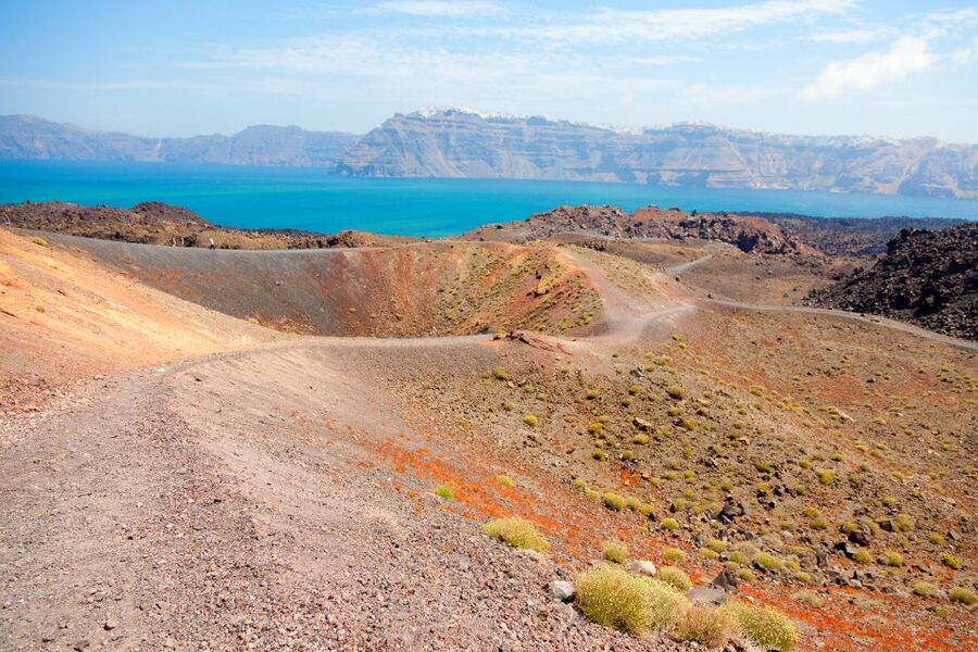 Santorini: Volcano and Hot Springs Sunset Dinner Cruise - Hot Springs at Palia Kameni: Warm Water, Sulfur Smells, and a Simple Swimsuit Trick